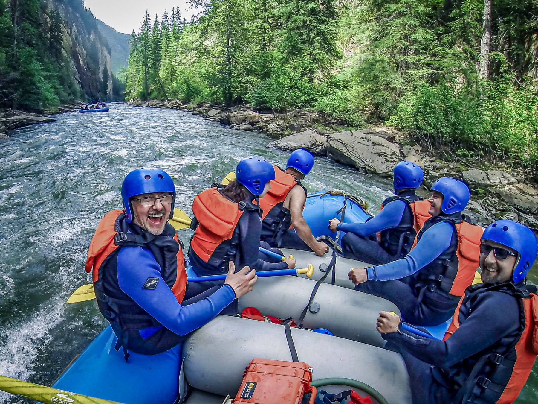 a group of people on a raft